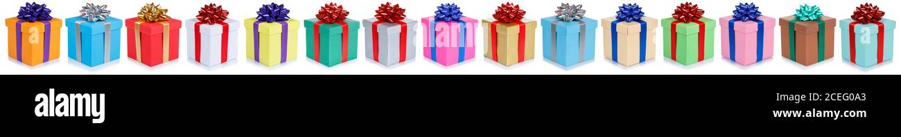 Christmas gifts many birthday presents in a row gift boxes isolated on a white background Stock Photo