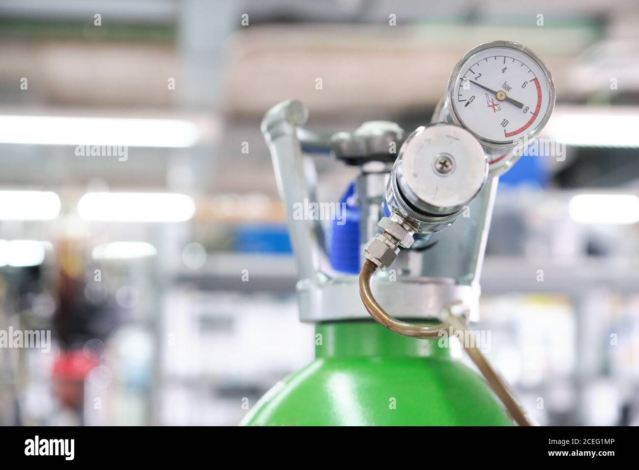 Gas cylinders with pressure gauge in a specialized laboratory. Laboratory material. Stock Photo