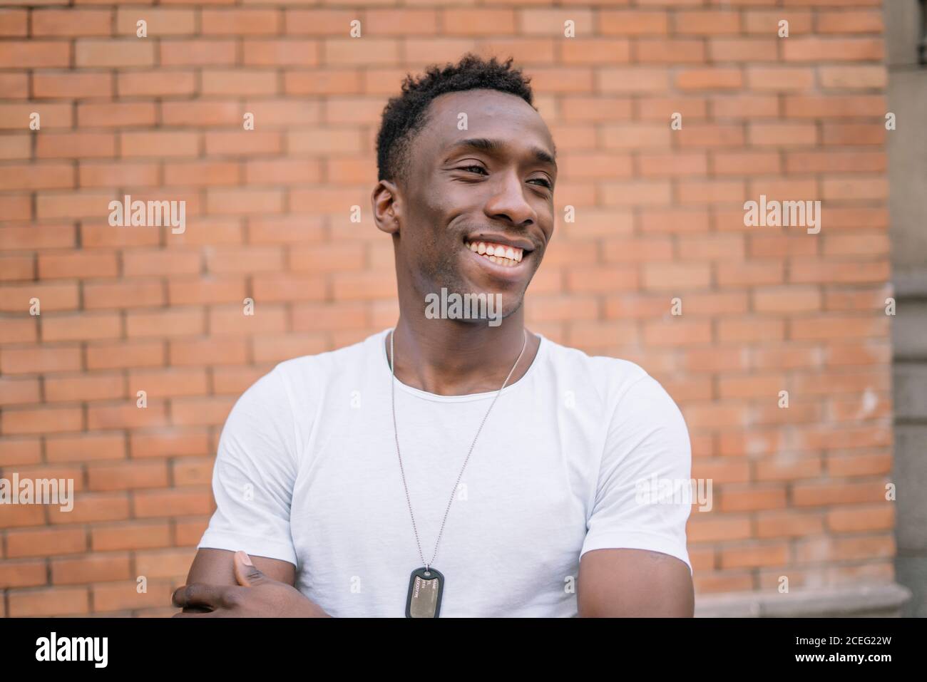 African man in white shirt posing. Stock Photo