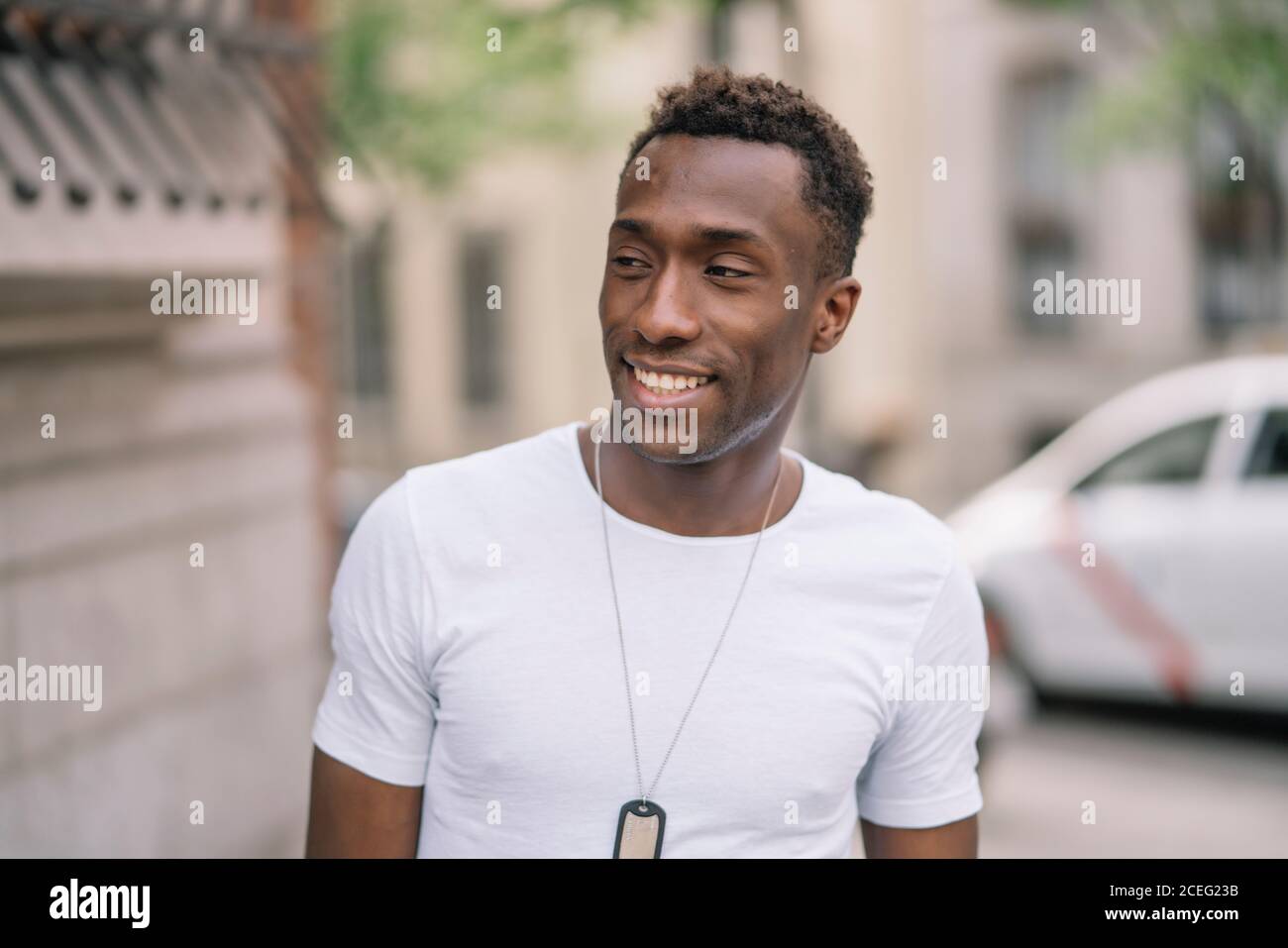 African man in white shirt posing. Stock Photo
