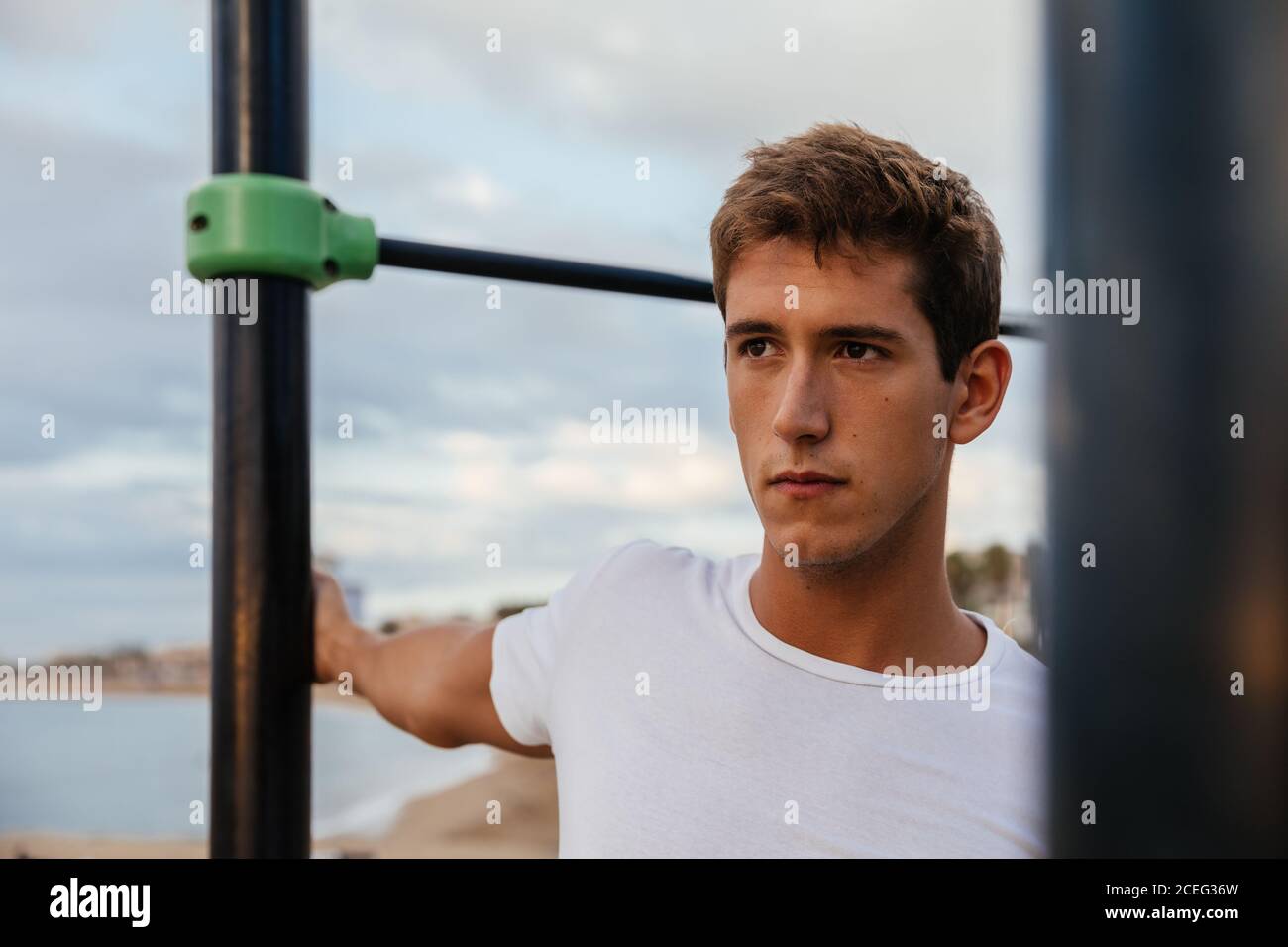 Male athlete doing stretching outside. Stock Photo
