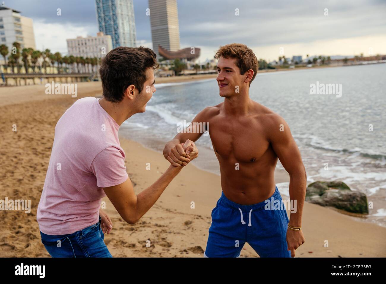 Two athletes arm wrestling on the outside Stock Photo Alamy