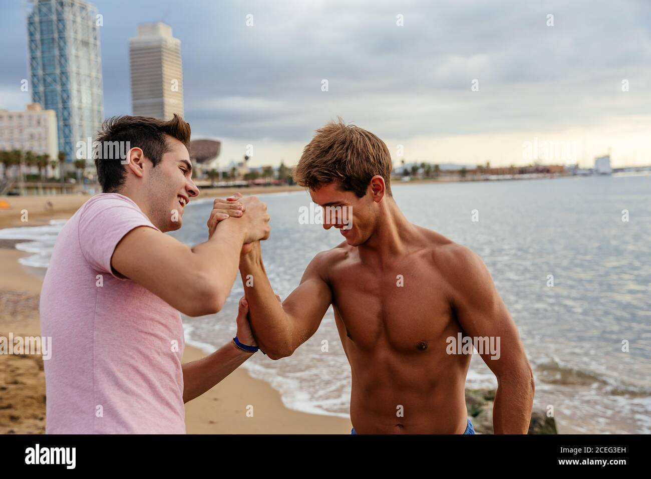 Two athletes arm wrestling on the outside Stock Photo Alamy