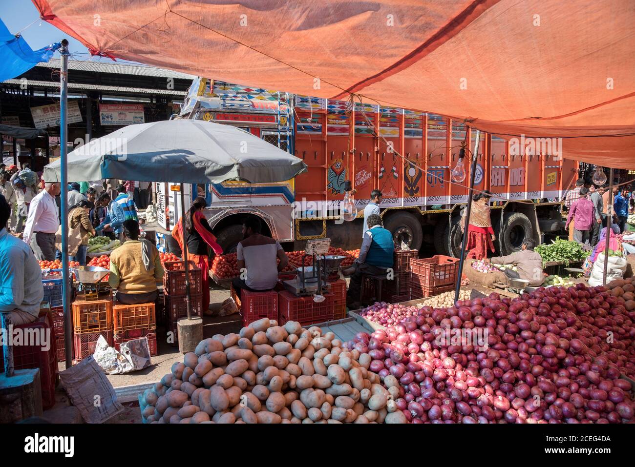 Vendors selling vegetables in a crowded wholesale market Stock Photo Alamy