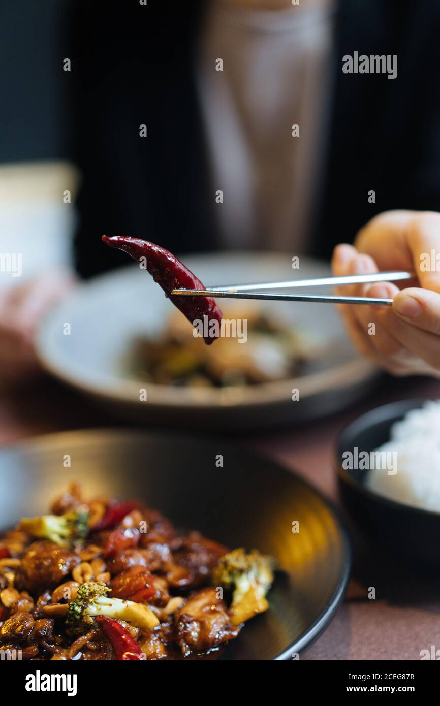 Red Hot Chili Pepper Eating Woman High Resolution Stock Photography and ...