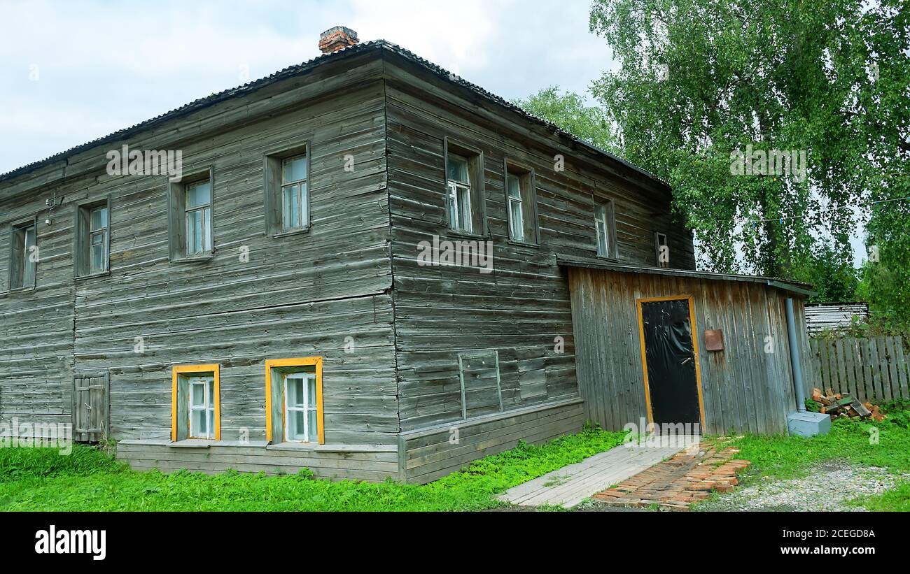 Old Russian wooden houses in the village and provincial town of Arkhangelsk near-polar regions Stock Photo