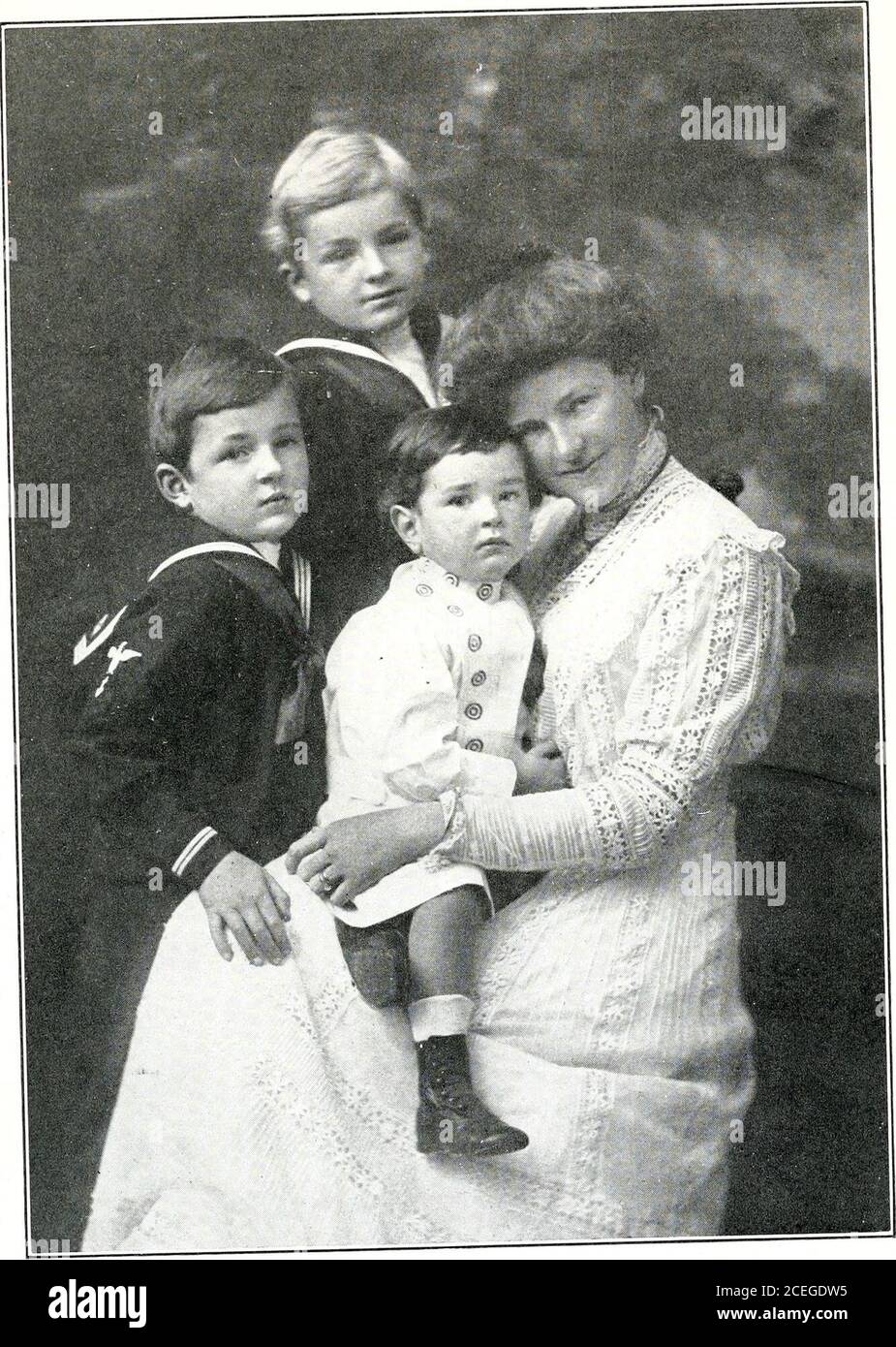 . www.flickr.com/photos/internetarchivebookimages/tags/book.... RT. REV. JAMES DE WOLF PERRY, D. D. Bishop of Rhode Island Second son of Rev. James De Wolf Perry. MRS. LLIZABLTH R. (PLRRY) HUBBARD AND CHILDREN John Perry Russell Sturgis James DeWolf Born. Ocober 26th, 1 903 Born. Sept., 8th. 1 901 Born, Dec. 7th. 1 906 Stock Photo