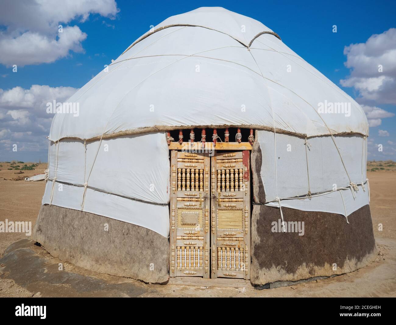 Exterior of traditional nomad tents called yurtas placed in group of