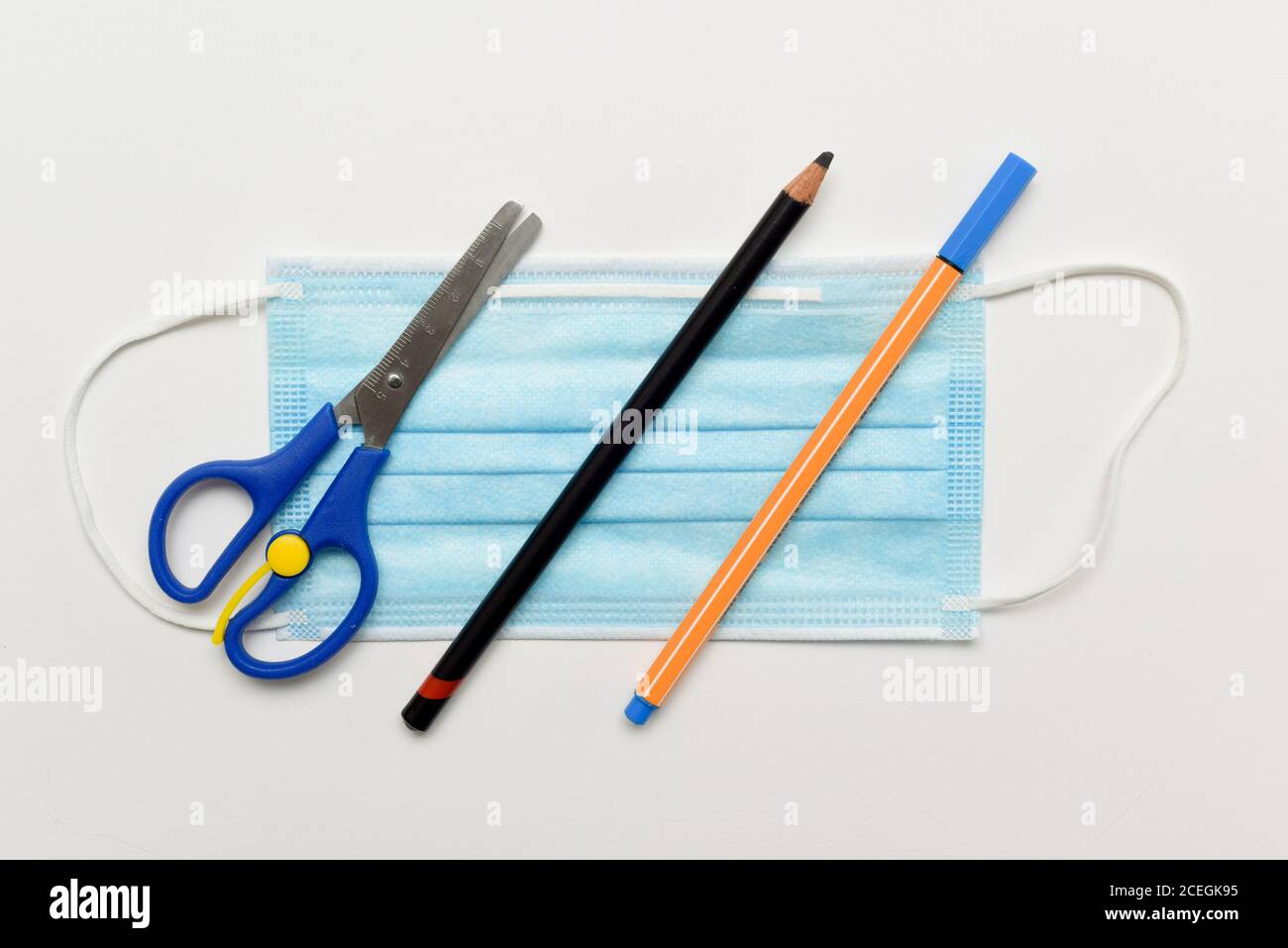 Back to school stationary with face mask to prevent spread of virus and