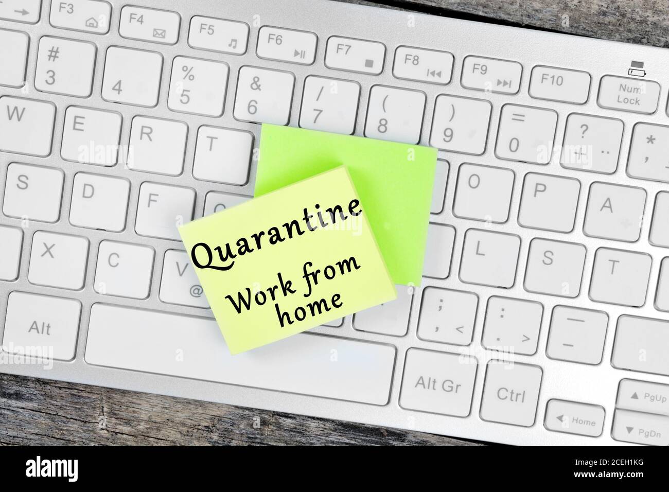Quarantine Work from home text on yellow sticky notes Stock Photo