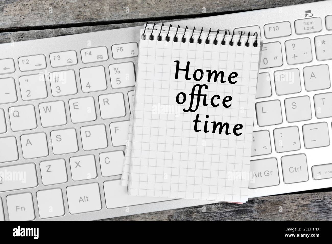 Home office time word on notebook page Stock Photo