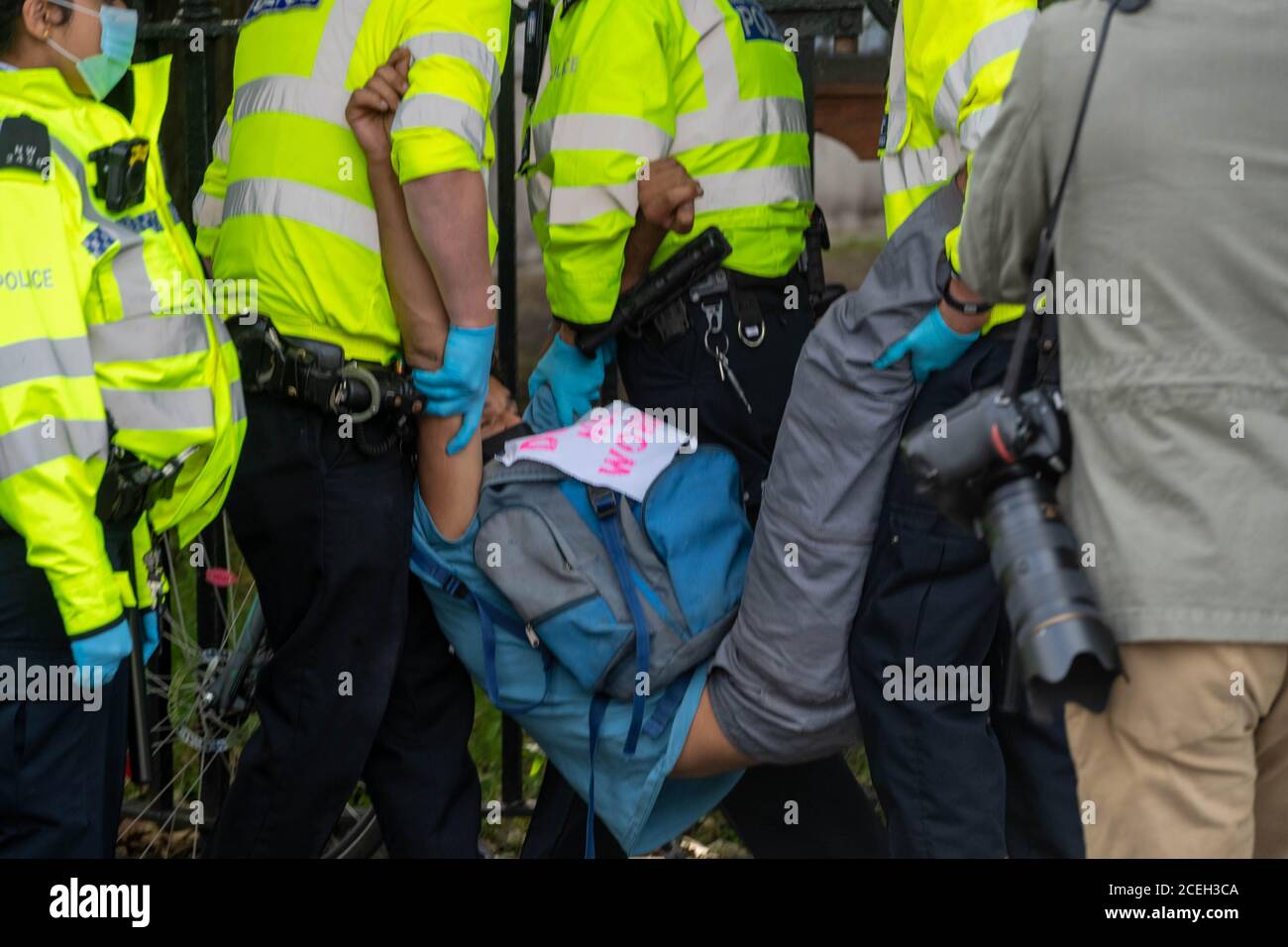 London, UK. 1st Sep, 2020. XR (Extinction Rebellion ) protesters are moved off the road outside the Houses of Parliament by the police to clear the highway Credit: Ian Davidson/Alamy Live News Stock Photo