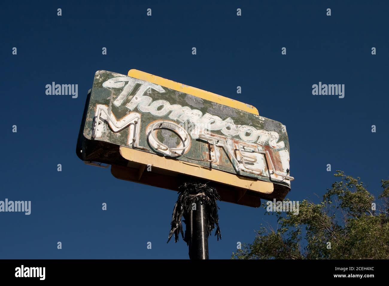 A weathered and faded neon sign for a defunct motel in the virtual ...