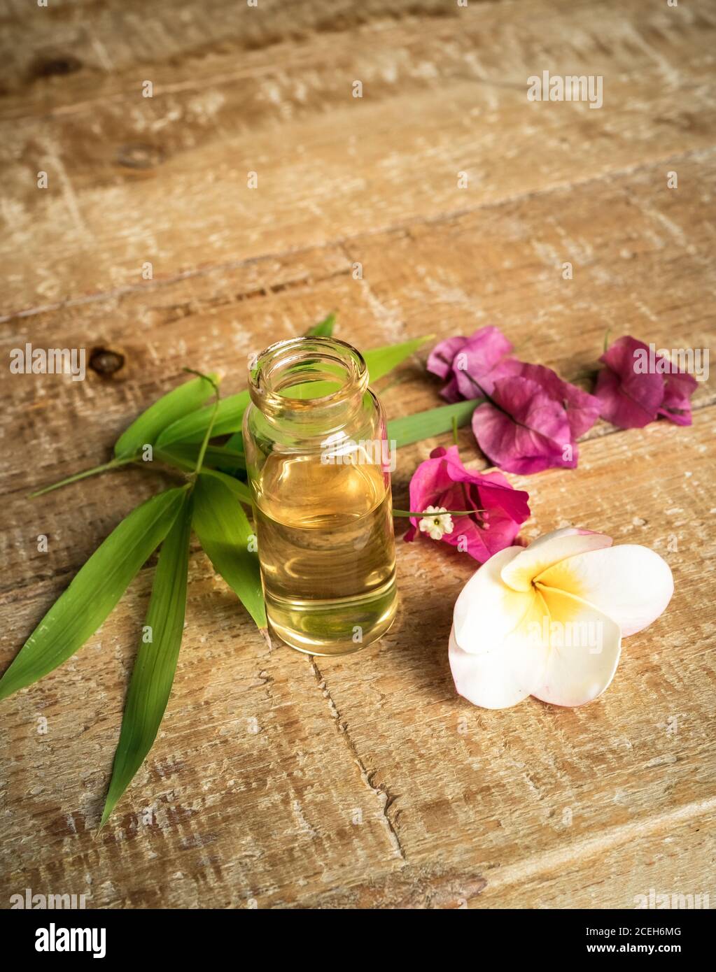 Aromatherapy herbal oil bottles aroma with white flower Frangipani  Plumeriaon with nature background / Essential oils natural on wooden table  and orga Stock Photo - Alamy