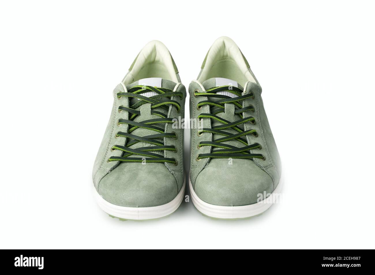 Men's green nubuck leather sneakers isolated on white background