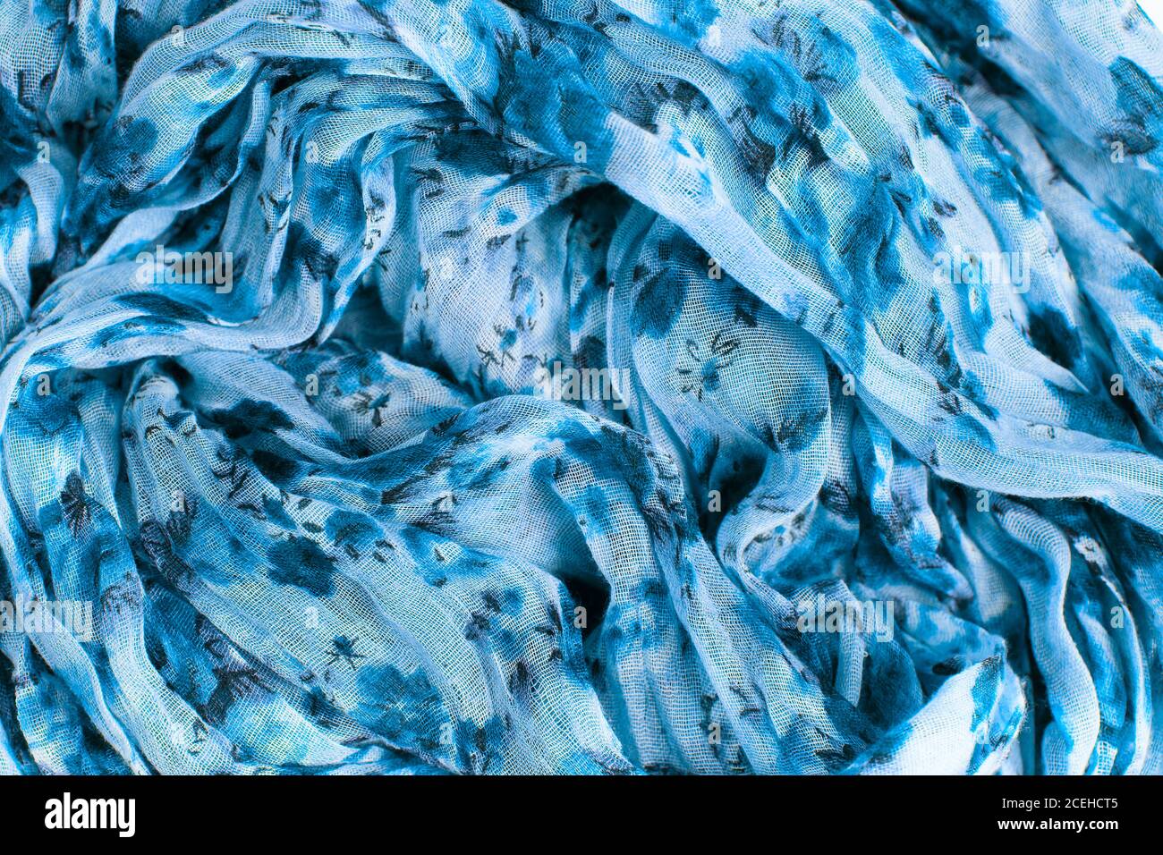 Flower patterned crumpled fabric texture background. Foulard made from  modal and cashmere with a positional floral print Stock Photo - Alamy