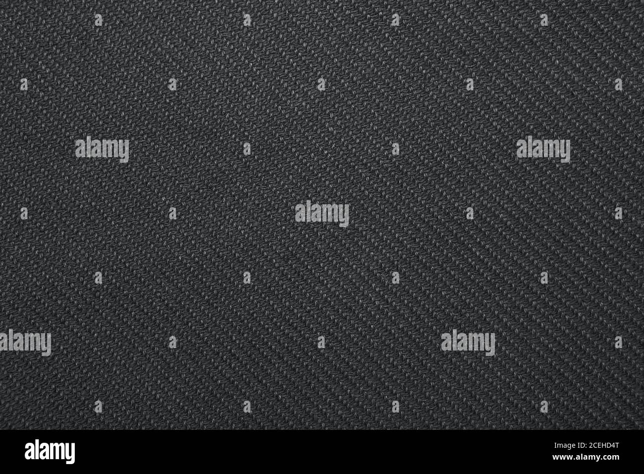 Black twill weave fabric pattern texture background closeup Stock Photo