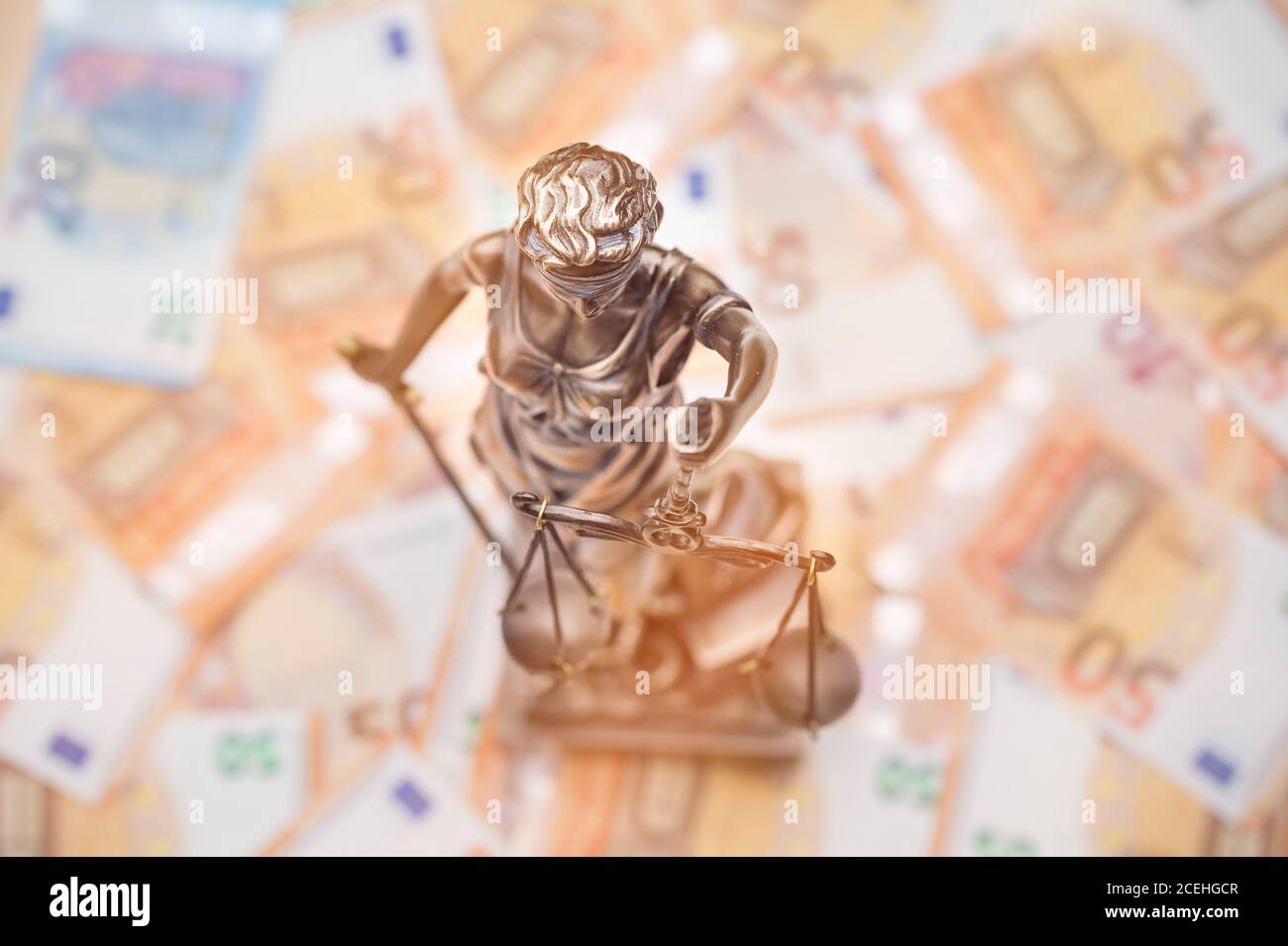 Lady Justice is on several 50 and 20 Euro bills. Concept photo for a lawsuit where a lot of money is at stake. Stock Photo