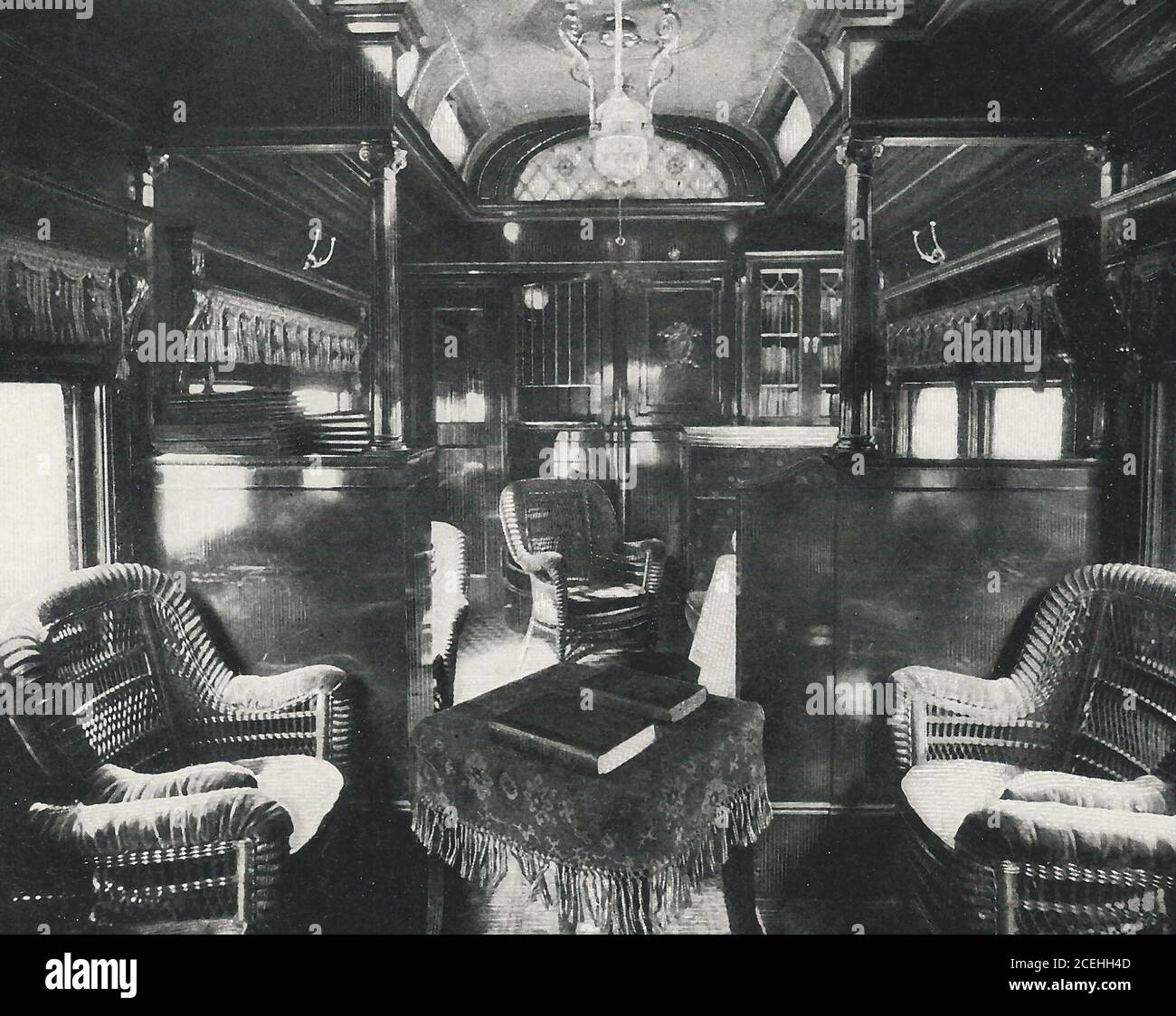 Black Diamond Express - Smoking Room and Cafe Car - Luxury Train Travel, circa 1920 Stock Photo