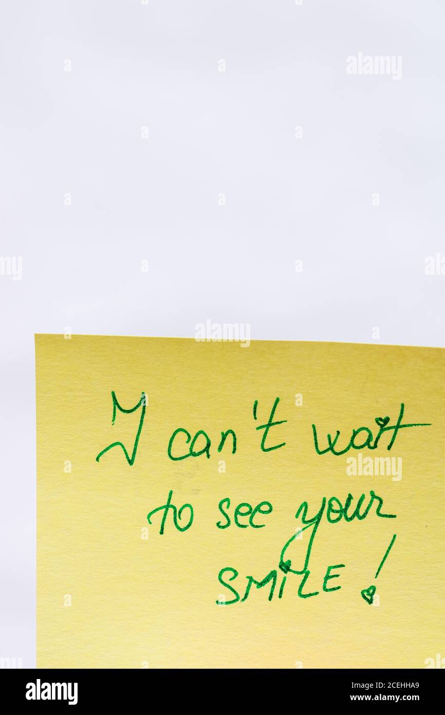 Smile Wait I can not wait to see your smile handwriting text close up isolated on ...