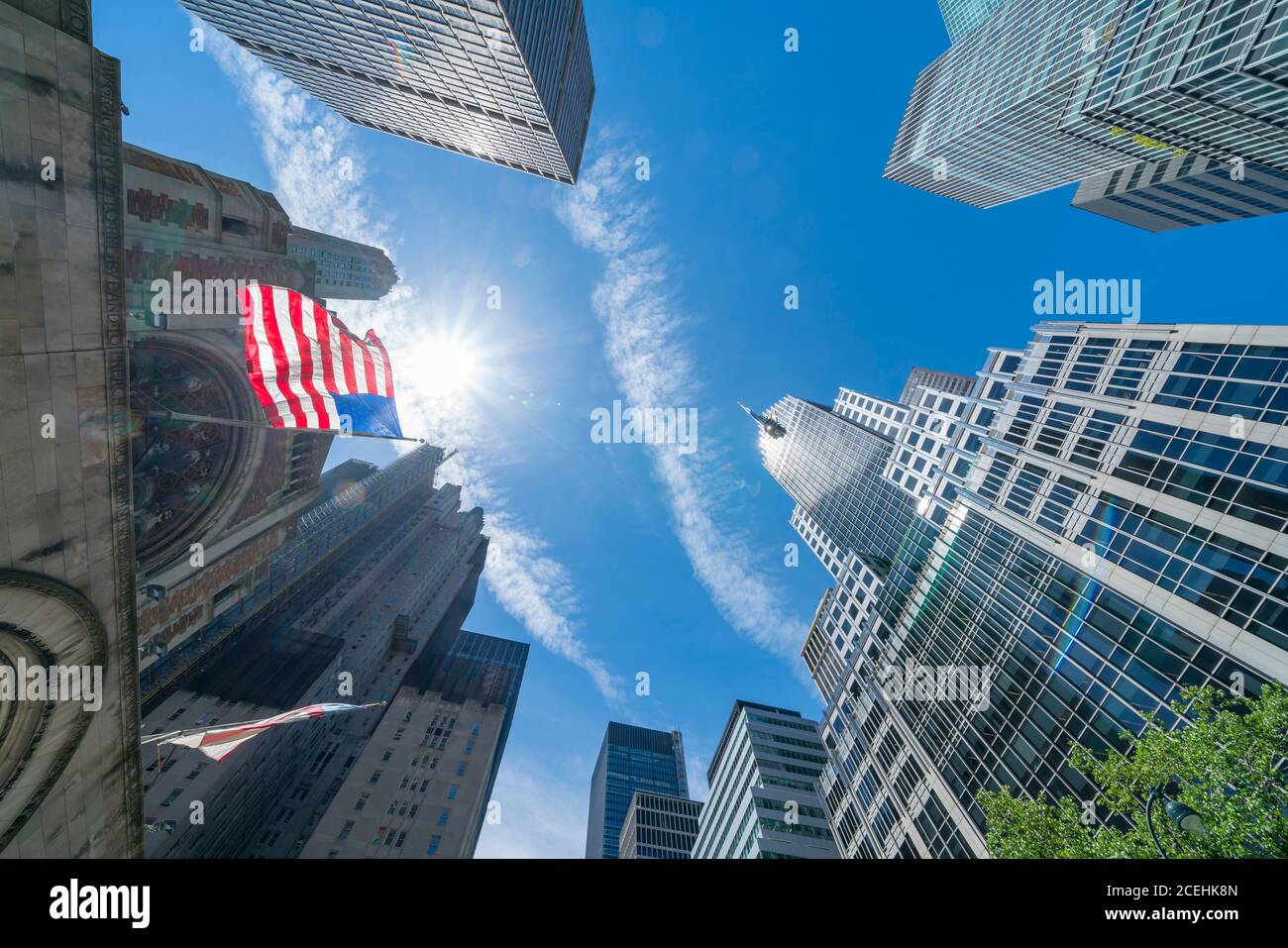 Rows of Midtown Manhattan high-rise buildings stand along the Fifth ...