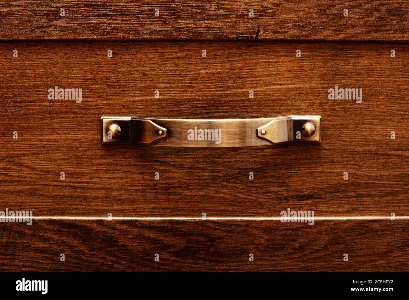 detail of decorated furniture drawers. old drawer damper. Closeup