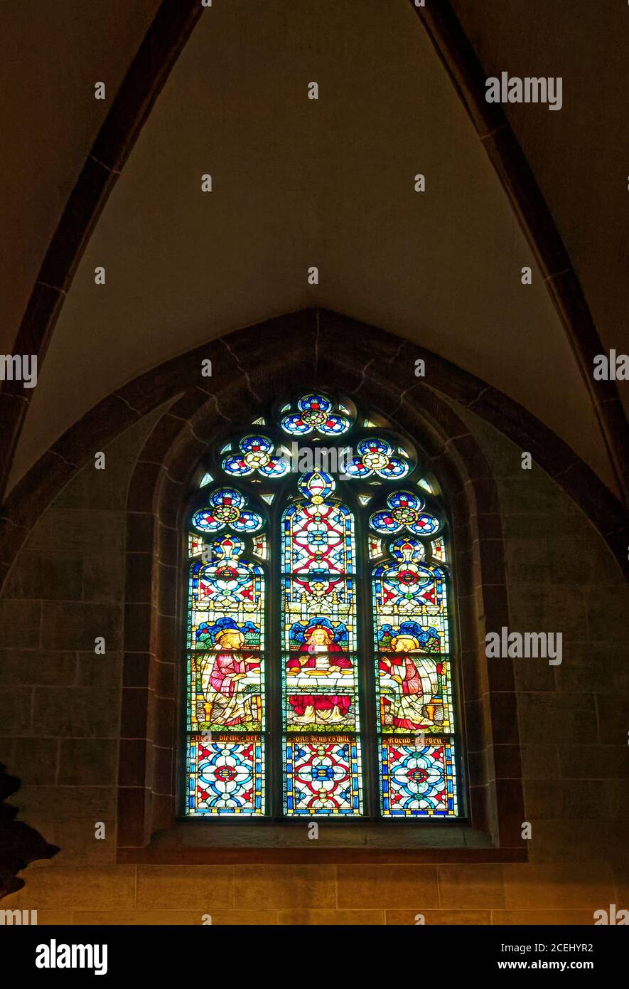 stained glass window; Jesus at table, art, Basel Minster; medieval cathedral; old; Protestant church; religious building; late Romanesque; Europe; Bas Stock Photo
