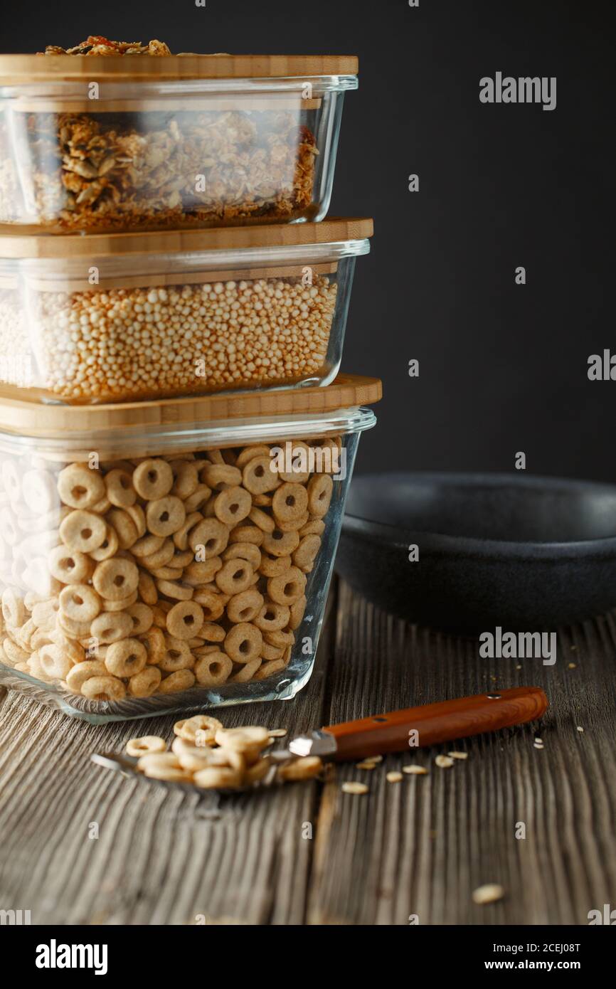 Breakfast cereal. Glass boxes with granola, cereal rings and Quinoa