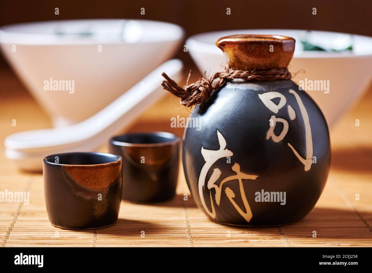 Japanese Sake set from a bottle and two shot glasses Stock Photo Alamy