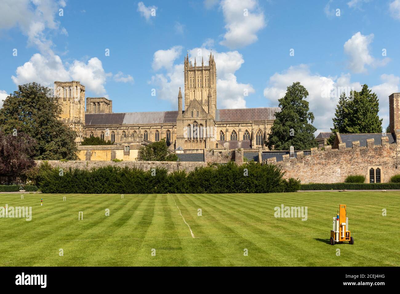 Croquet at The Wells Palace has been played there for nearly a century. The lawn ready for play with Wells Cathedral in the background, Wells,Somerset Stock Photo