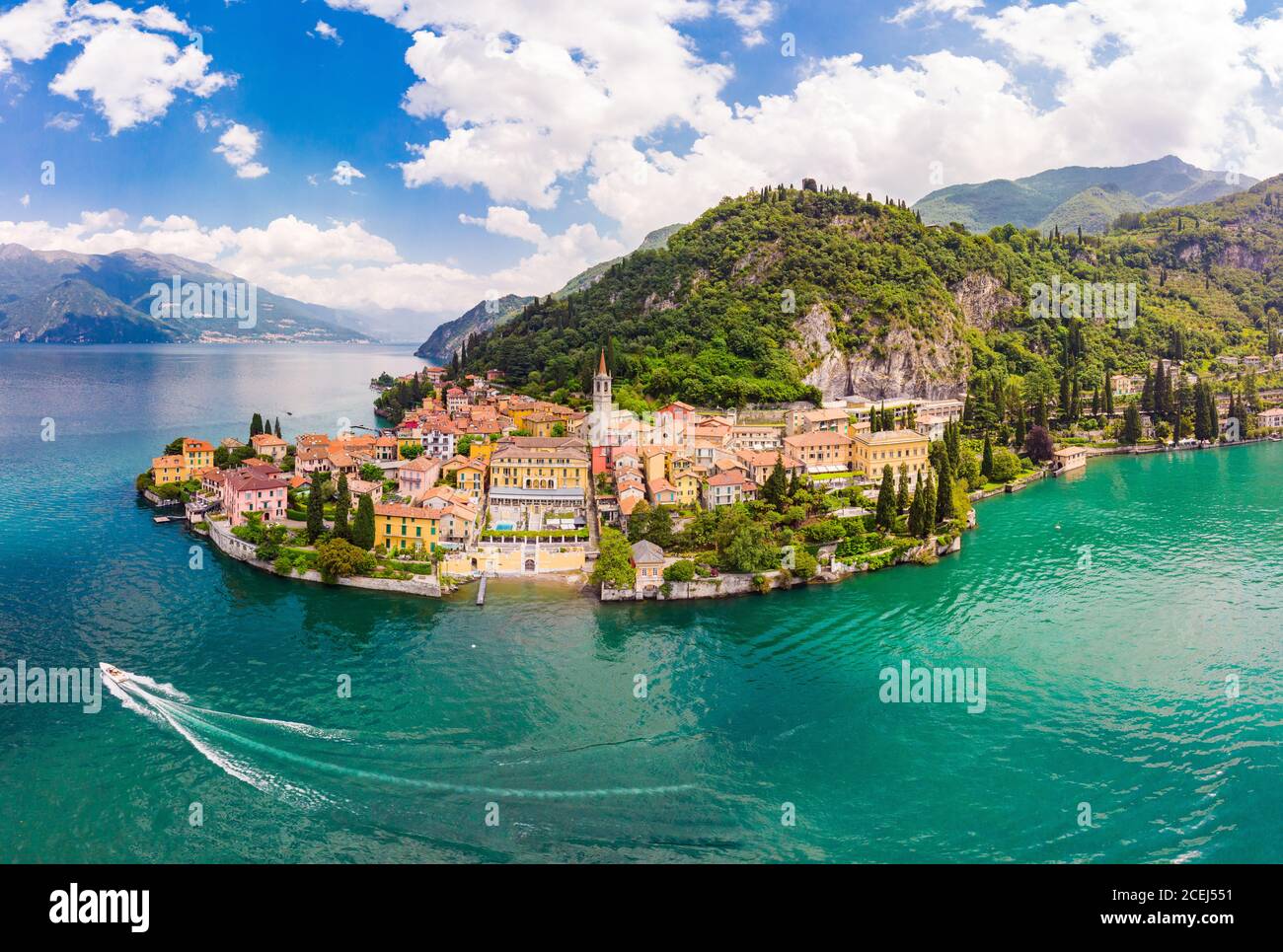 Beautifull aerial panoramic view from the drone to the Varenna - famous old Italy town on bank of Como lake. High top view to Water landscape with Stock Photo