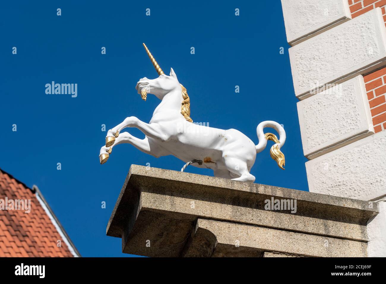The old town of Lüneburg, central square Am Sande, with medieval gabled houses, Unicorn,  Lower Saxony, Germany Stock Photo