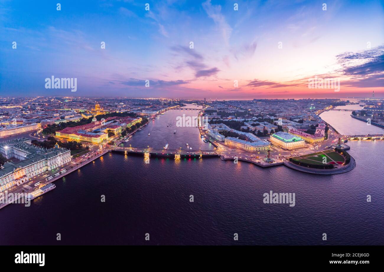 Beautiful aerial evning view in the white nights of St. Petersburg, Russia, The Vasilievskiy Island at sunset, Rostral Columns, Admiralty, Palace Stock Photo