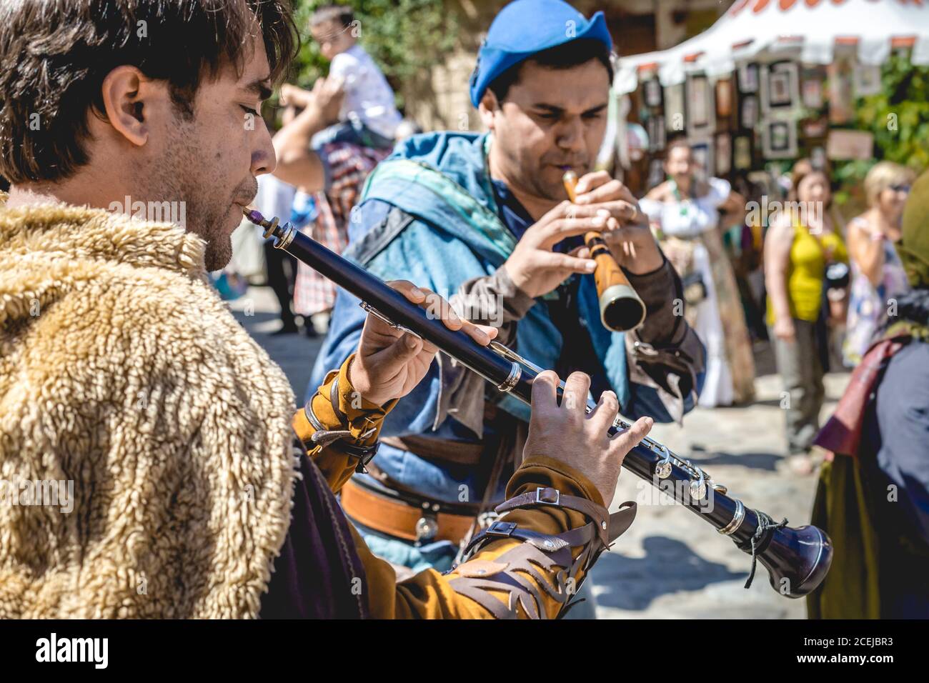 MEDIEVAL MARKET - PUEBLA DE SANABRIA - ZAMORA - SPAIN - AGOUST 13, 2017: Group of musicians in traditional clothes jamming on street during the funfair Stock Photo