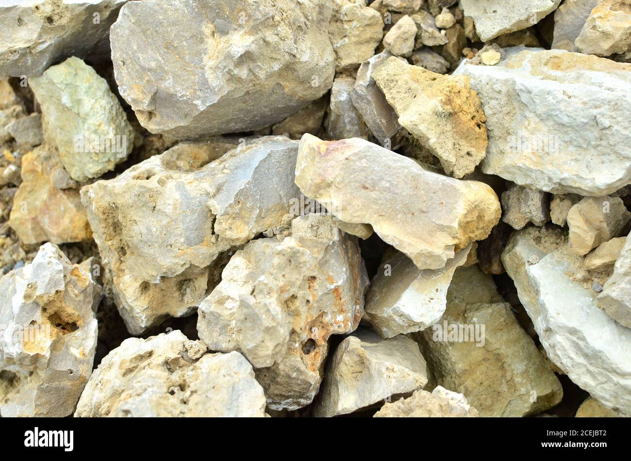 Natural stones dolomite close up in the limestone open-pit mining. Building  materials, wall background, texture. Industrial mining area Stock Photo -  Alamy
