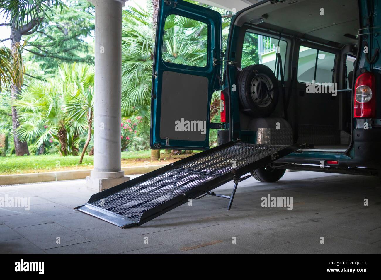 Accessible vehicle with ramp for people with disabilities on wheelchair