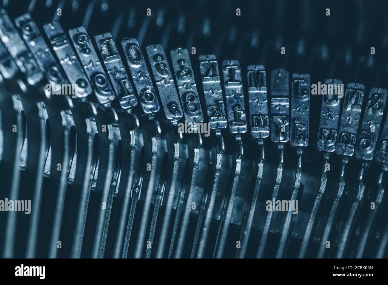 Close-up metal typebar of mechanical typewriter with Western script Stock Photo