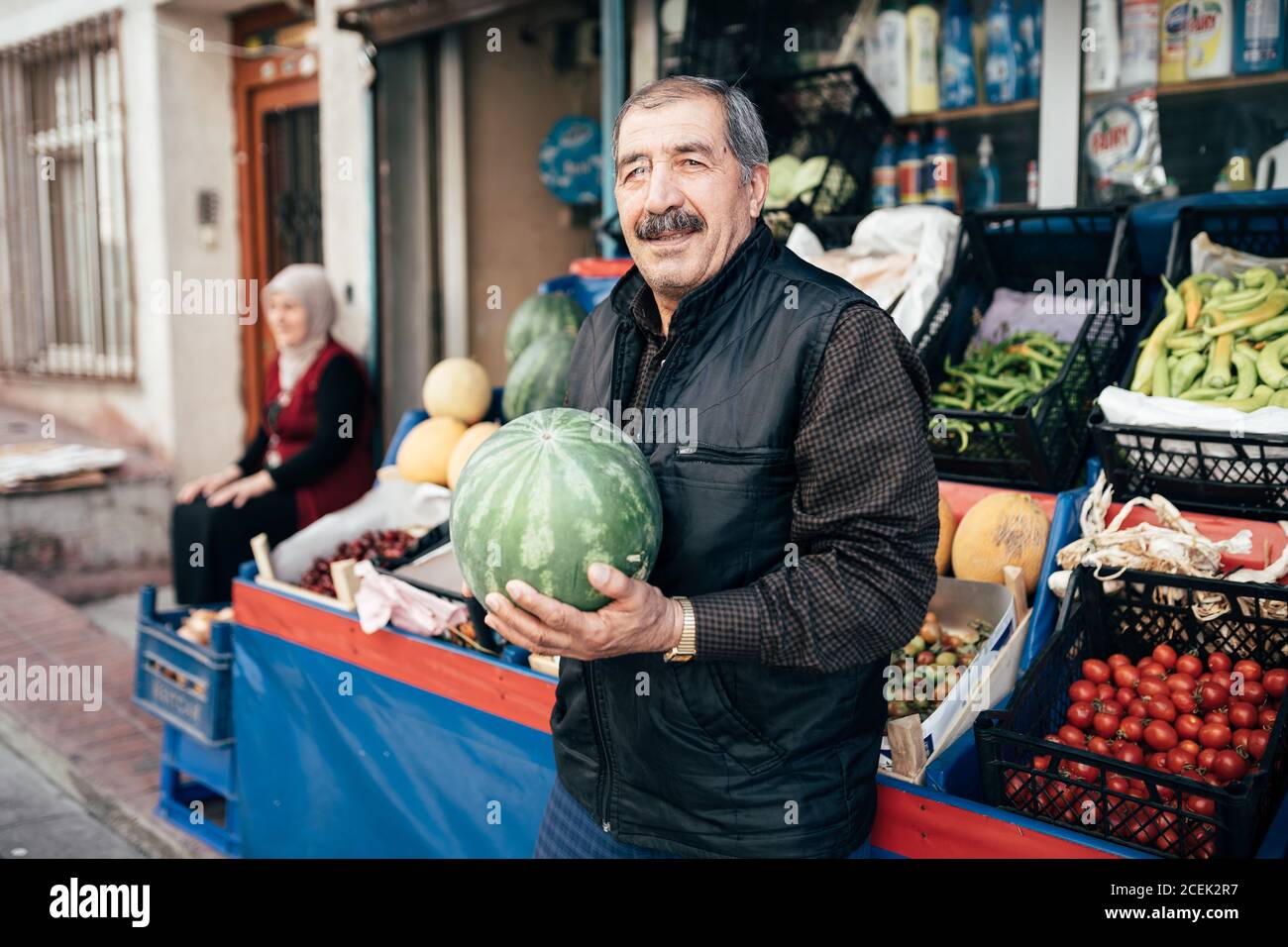 ISTANBUL,TURKEY-JUNE 7:Guys slicing watermelon to sell at their