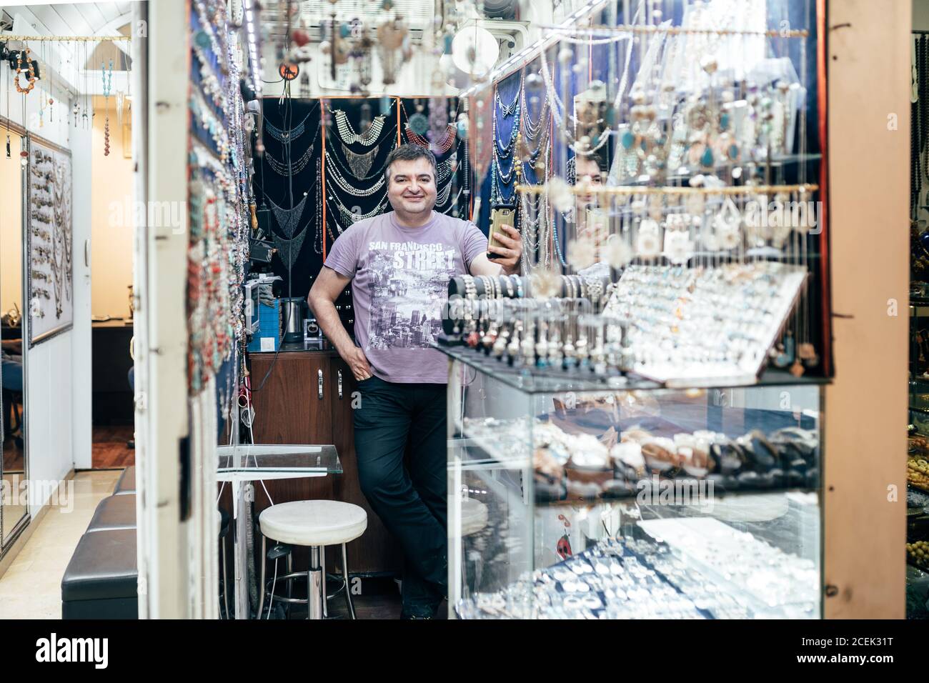 Istanbul, Turkey - August,?20 2018: Cheerful adult shop assistant in  bijouterie shop looking at camera Stock Photo - Alamy
