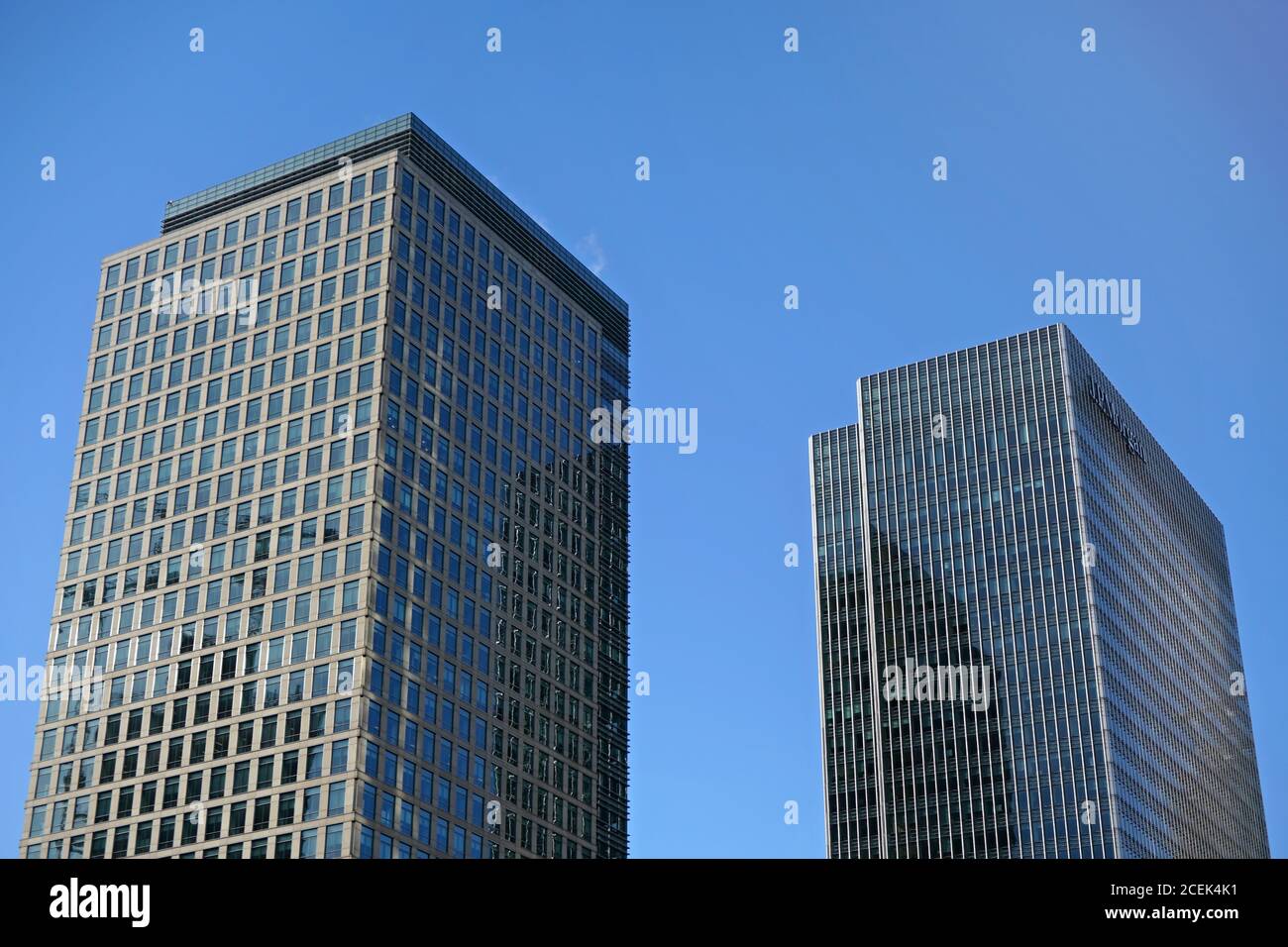 London, United Kingdom - February 03, 2019: 40 and 25 Bank Street buildings designed by Cesar Pelli & Associates on sunny day. Most of skyscrapers in Stock Photo