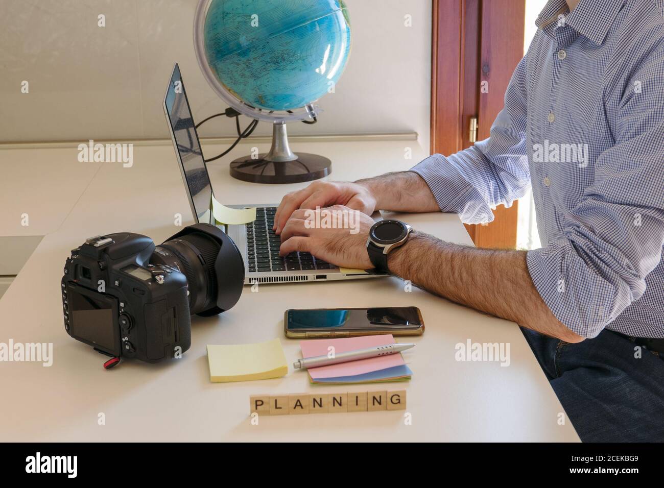 Planning a trip laptop map hi-res stock photography and images - Alamy