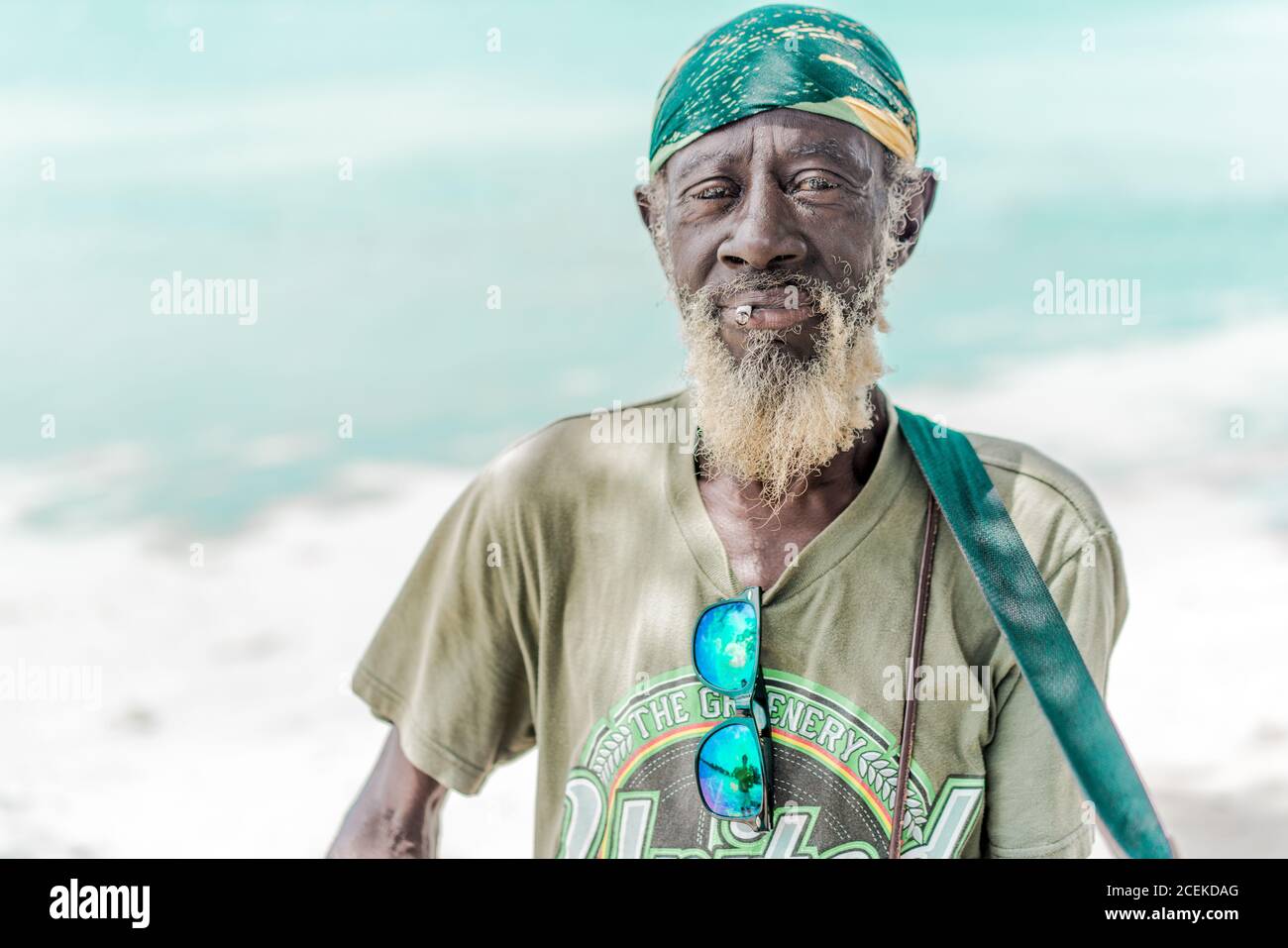 Jamaican man playing guitar Stock Photo