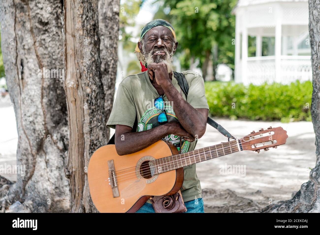 Jamaican man playing guitar Stock Photo