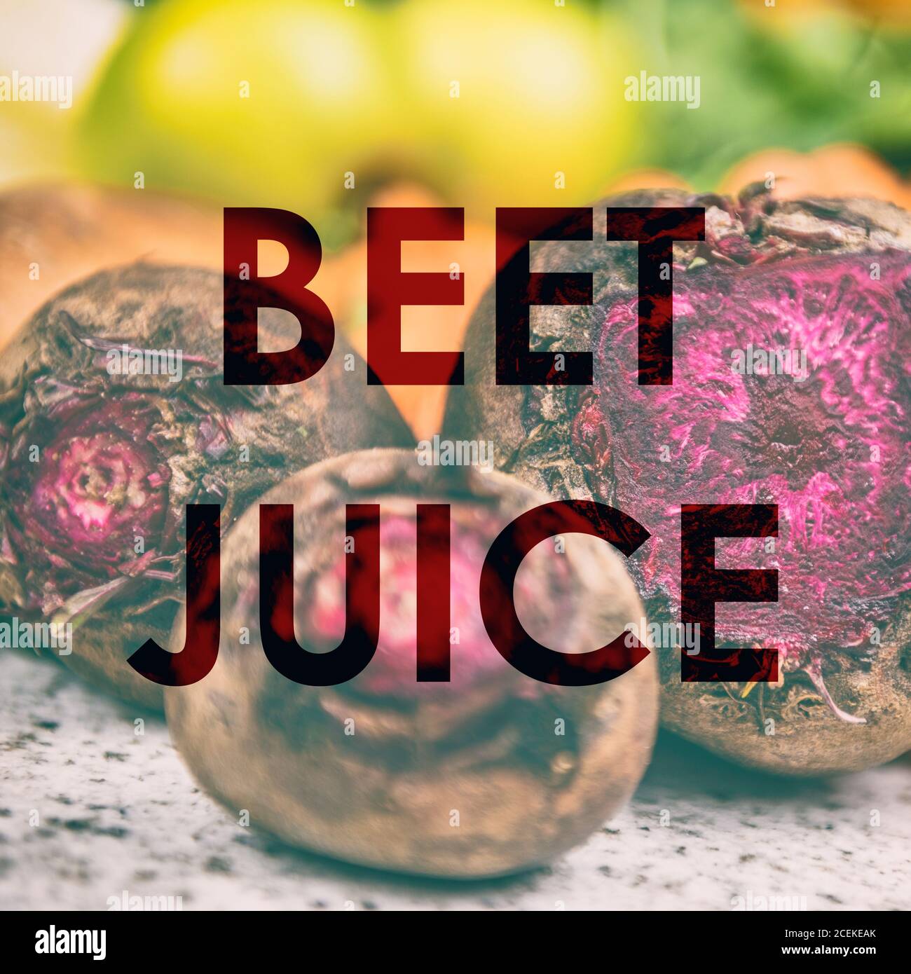 BEET JUICE words written on photo background of fresh red beets in kitchen or farms market. Raw organic juicing trend of vegetable drink for weight Stock Photo