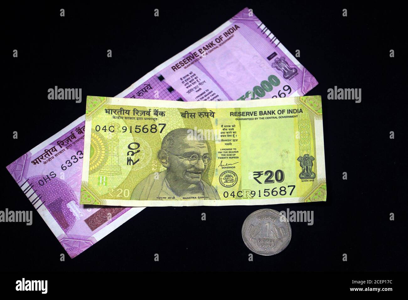 Indian Money with 2021 new year concept on black background. Concept of New Year 2021 with Indian currency. Indian currencies on black background. Stock Photo