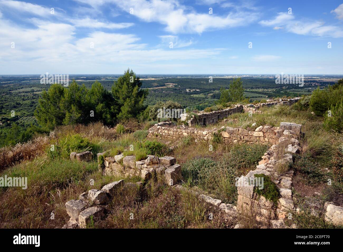 Remains Troglodyte Houses in Ruined Fortified Village or Castrum de Montpaon, inhabited c12-14th dates from c7thBC Fontveille Alpilles Provence France Stock Photo