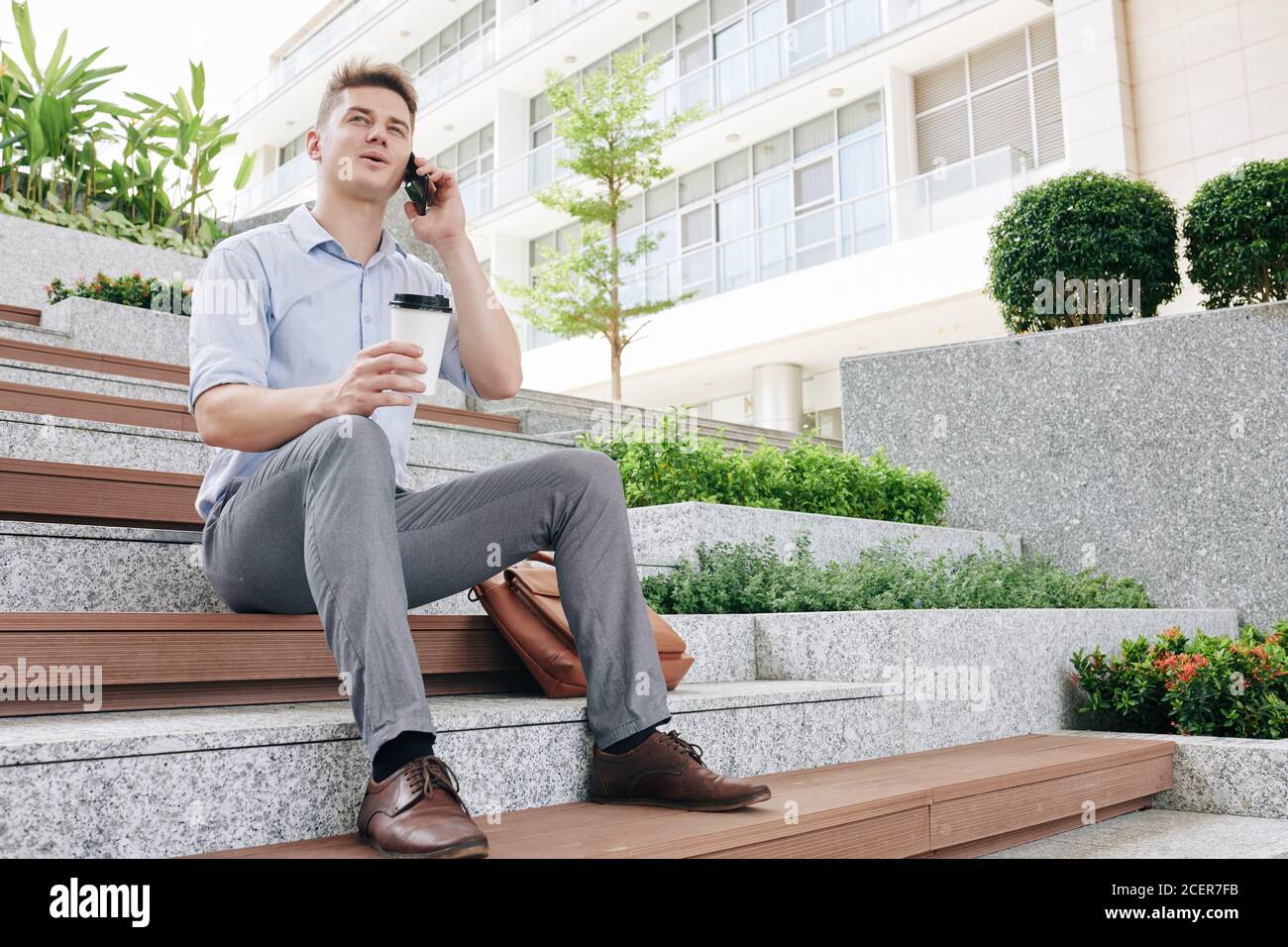Young entrepreneur calling on phone Stock Photo