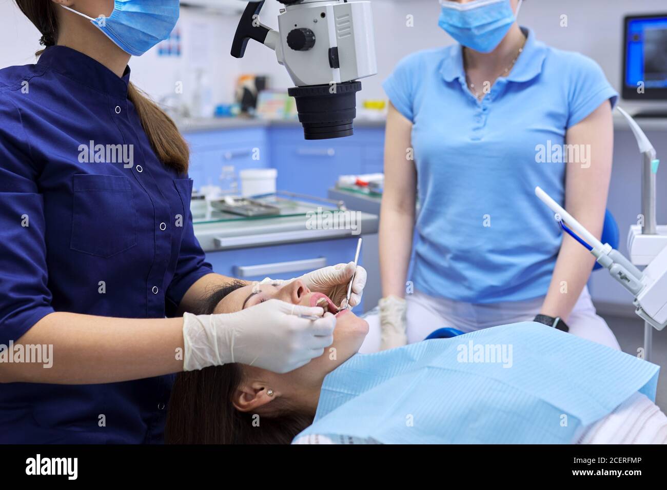 Healthcare dentistry medicine, woman doctor dentist treats teeth Stock