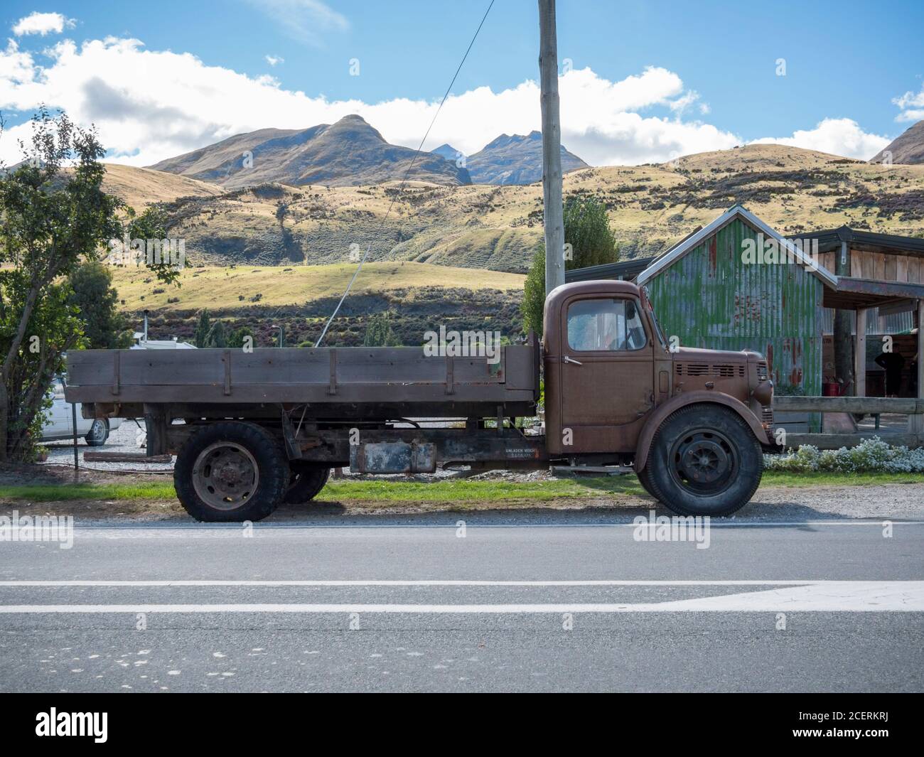 An old Bedford lorry parked at the roadside in Glenorchy New Zealand Stock Photo