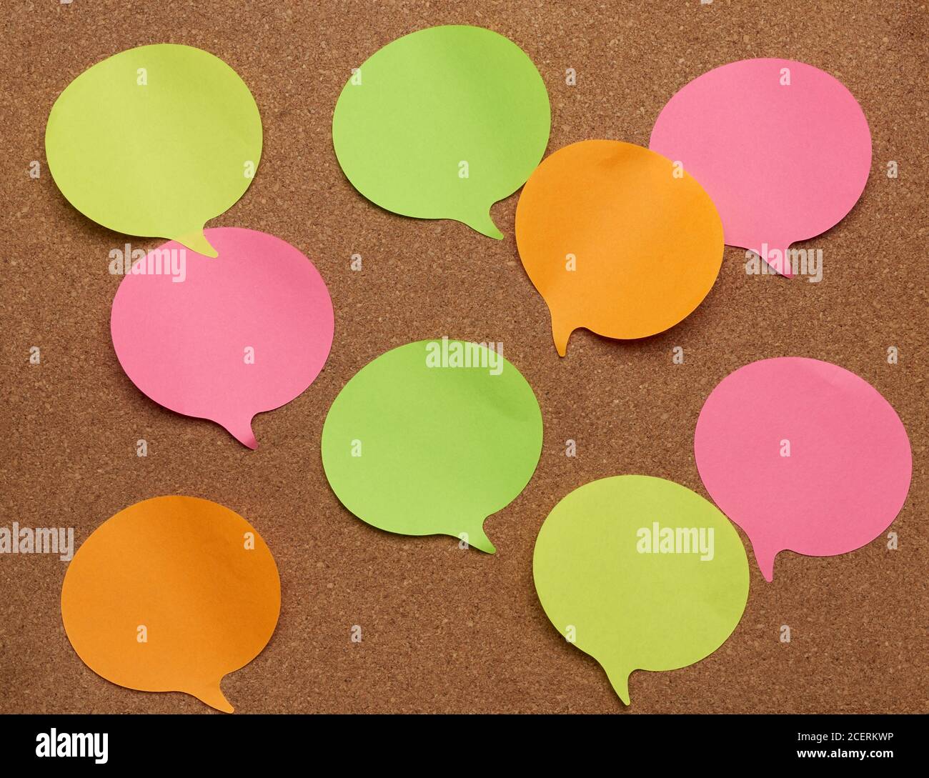 colorful paper stickers glued on brownboard, idea and multitasking, close up Stock Photo